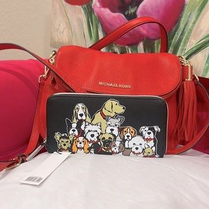 Michael Kors rich red pebbled leather purse.